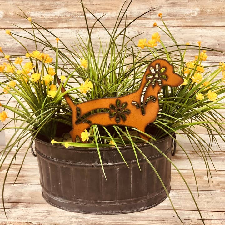 Rusty metal dachshund yard stake for dog lovers’ gardens and outdoor decor