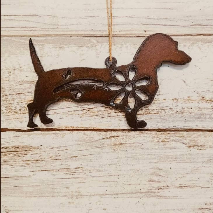 Rustic dachshund ornament made of metal for garden or holiday pet-themed decor