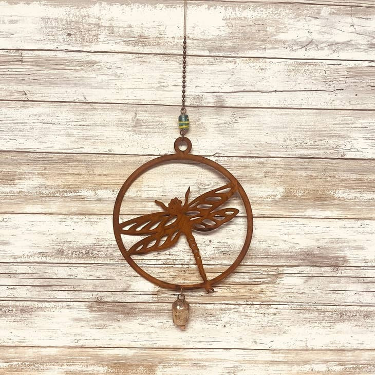 Dragonfly-themed rustic metal bell chime for peaceful garden spaces