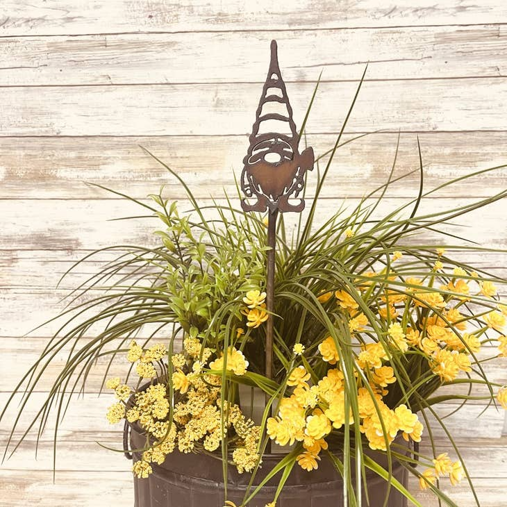 Rustic garden gnome with spade metal plant stake for outdoor decor