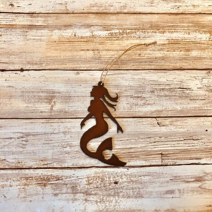 Rustic metal mermaid ornament with heart detail in tail for beach decor