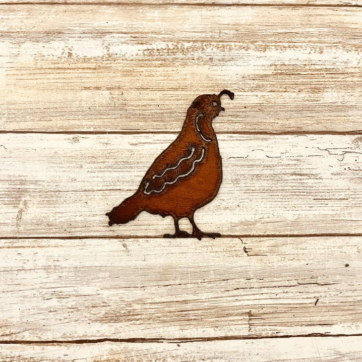 Rusty metal magnet shaped like a quail, great for fridge or metal decor