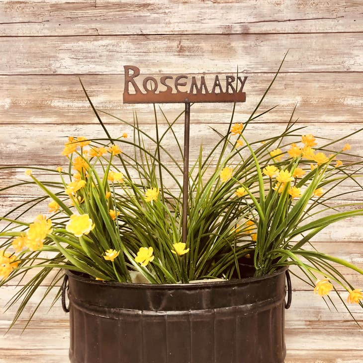 Metal plant stake labeled “Rosemary” for herb or kitchen gardens