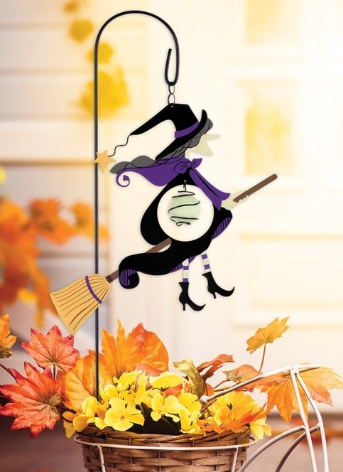 Glow-in-the-dark witch garden stake for Halloween yard decoration